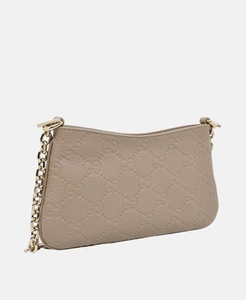 Gucci — Sac à bandoulière en cuir Brainy